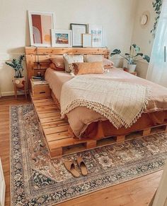 a bed made out of wooden pallets in a bedroom