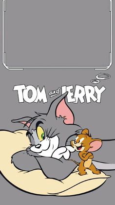 an image of tom and jerry on the bed with their name plate in the background