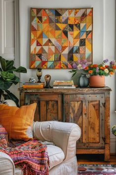 a living room filled with lots of furniture and flowers on top of a wooden table