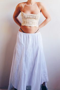 Embrace the free-spirited charm of boho fashion with our Vintage White Cotton Boho Long Panel Skirt, a versatile piece that captures the essence of countryside hippie style. Crafted from soft, breathable cotton, this long skirt is perfect for summer days when worn as is and easily transitions into fall by layering with cozy tops and sweaters. The flowing panel design adds a touch of effortless elegance, while the white color makes it a timeless staple in any wardrobe. Whether you're strolling through a farmers' market, lounging by the beach, or adding a bohemian flair to your autumn outfits, this vintage skirt offers comfort and style in every season. Size: tag states size large however best fit is a femme small-medium Best Fit Low Waisted: Femme 4-6 high waisted femme 8-10 Material: cotto Panel Skirt, Fall Layering, Y2k Boho, Cozy Tops, Paneled Skirt, Fall Layers, Summer Skirts, Boho Casual, Low Waisted