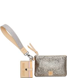 From Consuela&#x2C; the Wesley Metallic Combi Wristlet features: Natural leatherLogo accentsExterior pouchFive card slots with D-ringSilver glitter wristletCardholder Approx. 5" H x 8" W Imported. Consuela Bags, Small Stuff, Gold Top, Wristlet Wallet, Leather Pouch, Natural Leather, Pocket Pouch, Purse Wallet, Sale Items