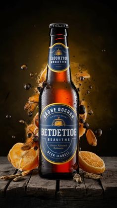 a bottle of beer sitting on top of a wooden table next to orange slices and water droplets