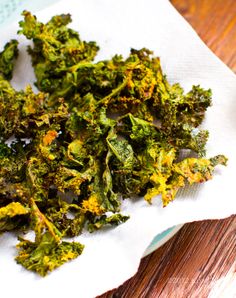 a pile of broccoli sitting on top of a white napkin