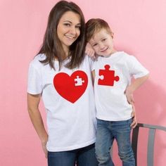 Matching Mommy & Me Short Sleeve Tee Shirts. This Listing Is For The Adult Heart Shirt, See Also The Kid Puzzle Piece Listing For Match. Brand New In Package. White Cotton Top For Mother's Day, White Cotton Tops For Mother's Day, White Short Sleeve Tops For Family Matching, Valentine's Day White Graphic Print Shirt, White Short Sleeve Tops With Heart Print, Casual Red Shirt With Heart Graphic, Family Matching Red Tops With Letter Print, Family Matching Short Sleeve Tops With Heart Graphic, Cute Red Heart-shaped Top