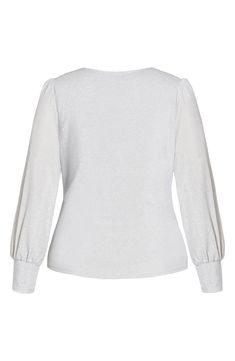 A shimmery knit fabric adds a pop of glamour to this surplice V-neck top framed by billowy long sleeves. 26" length (size X-Small) Surplice V-neck Long sleeves Lined 58% nylon, 34% metallic fibers, 8% elastane Hand wash, dry flat Imported Glamorous V-neck Winter Top, Elegant V-neck Long Sleeve Top For Winter, Glamorous Long Sleeve Glitter Tops, Chic Long Sleeve Glitter Tops, Metallic Long Sleeve Tops For Fall, Elegant Long Sleeve Top For Winter Party, Elegant Long Sleeve Party Top For Winter, Chic Shimmer Top For Fall, Chic Shimmer Tops For Fall