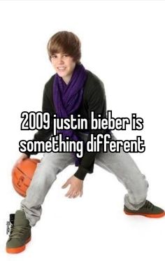 a man holding a basketball in his hand with the words 2009 justn bieber is something different