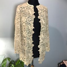 Gorgeous Ralph Lauren Black Label 100% Cotton Crochet Open Front Cardigan, Leather Trim, Floral Pattern, Long Sleeve Mesh Cardigan Open Front. Approx Measurement Ptp 19’’-21’’ Length 29’’ Material Content Body 100% Cotton Framing 100% Polyester Trim 100% Lamb Leather Beige Fitted Open Front Cardigan, Fitted Beige Open Front Cardigan, Elegant Cream Cardigan For Formal Occasions, Elegant Cream Long Sleeve Cardigan, Elegant Cream Outerwear For Layering, Elegant Cream Open Front Outerwear, Elegant Cream Open-front Outerwear, Elegant Cream Cardigan For Layering, Cream Long Sleeve Outerwear For Evening