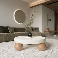 a living room filled with furniture and a white rug