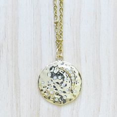 This necklace is made from a gold plated coin that is super shiny! I bet you can even see yourself in it! The pendant has a night sky design- all those stars and moon can't compare. And they don't have to because they have clear cz stones to add shine and sparkle. What else do you need? Oh yeah and the coin hangs from a cool stainless steel gold plated chain of your choice. Isn't that awesome? You even get to pick your own chain style. I'd say that is a win win. Go you! You can choose the style Gold Celestial Pendant Medallion Necklace, Gold Celestial Medallion Pendant Necklace, Celestial Gold Necklace With Coin Pendant, Gold Celestial Medallion Necklace With Round Pendant, Gold Medallion Necklace With Moon Charm, Gold Celestial Charm Necklace With Round Pendant, Gold Moon Phase Coin Necklace Perfect As A Gift, Gold Moon Phase Coin Necklace As Gift, Celestial Gold Round Medallion Necklace