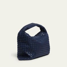 Bottega Veneta "Hop" hobo bag in denim intrecciato cotton and leather  Shoulder strap  Fold-over flap top with  Interior, one zip pocket  Approx. 9.4"H x 21.2"W x 5.1"D Made in Italy Modern Blue Woven Leather Bag, Blue Top Handle Bag With Intrecciato Weave, Blue Woven Leather Top Handle Shoulder Bag, Blue Woven Leather Shoulder Bag, Blue Woven Leather Shoulder Bag For Shopping, Intrecciato Weave Hobo Shoulder Bag For On-the-go, Designer Blue Shoulder Bag With Braided Handles, Designer Blue Shoulder Bag With Woven Leather, Designer Blue Woven Leather Shoulder Bag