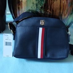 Nwt- Tommy Hilfiger Leather Crossbody Bag Description - Tommy Hilfiger Monogram Plaque On Front With A Front Pocket. - One Main Compartment. - One Interior Zipped Pocket. - Adjustable Crossover Strap. - Zip Closure. -Measurements: 8.5 Inches, A Height Of 6.5 Inches, And A Depth Of 3.5 Inches. -This Tommy Hilfiger Crossbody Bag Is Perfect For Any Occasion. Elegant Tommy Hilfiger Bag With Adjustable Strap, Elegant Tommy Hilfiger Bag, Chic Tommy Hilfiger Bag With Adjustable Strap, Tommy Hilfiger Crossbody Shoulder Bag For Travel, Tommy Hilfiger Everyday Crossbody Shoulder Bag, Tommy Hilfiger Shoulder Bag With Adjustable Strap, Tommy Hilfiger Crossbody Shoulder Bag For Daily Use, Tommy Hilfiger Crossbody Travel Bag, Tommy Hilfiger Travel Crossbody Bag