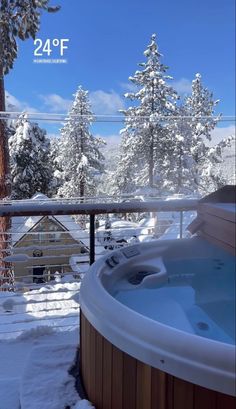 a hot tub sitting on top of a snow covered ground