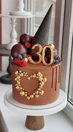 a chocolate cake with the number 30 on it