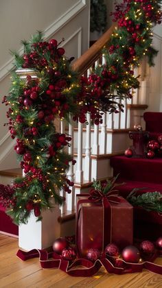 christmas decorations and presents are on the stairs