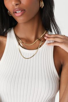 There's nothing sweeter than a chance to style the Lulus Total Decadence 14KT Gold Layered Herringbone Necklace! This necklace is bringing the maximum shine with its triple-layered herringbone chain silhouette, all plated in 14KT gold. Each chain has a different length and lays perfectly against the skin. This item is plated with real 14KT gold. Love it and it will love you back! Remove before exercising or showering, and when applying scents, lotions and sprays. Lobster Clasp Closure. Shortest Double Chain Snake Necklace For Layering, Snake Chain Necklace With Double Chain For Layering, Herringbone Chain, Herringbone Necklace, Lulu Fashion, Accessories Jewelry Necklace, Long Chain, 14kt Gold, Herringbone