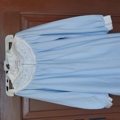 New Without Tag. Vintage. Light Blue Color. No Size Tag. Fits Like A Size Medium Blue Long Sleeve Bedtime Dress, Blue Long Sleeve Dress For Pajama Party, Long Sleeve Nightgown With Lace Trim For Sleepover, Long Sleeve Lace Trim Sleepwear For Sleepovers, Blue Cotton Dress For Pajama Party, Blue Long Sleeve Nightgown For Sleepover, Long Sleeve Blue Nightgown For Sleepover, Long Sleeve Blue Nightgown For Home, Long Sleeve Lace Trim Sleepwear For Bedtime