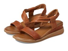 Comfortiva Marcy - Women's Sandals : Luggage : Unwind in effortless style wearing the Comfortiva Marcy. Embrace every step with the plush embrace of its asymmetrical leather sling upper and polyester lining construction. The cushioned padded footbed ensures exquisite comfort, while the comfortable demi wedge and EVA insole promise support and stability. Slip into luxury effortlessly. Rubber outsole. Imported. Measurements: Heel Height: 1 1 2 in Weight: 11.2 oz Product measurements were taken using size 6, width M (B). Please note that measurements may vary by size. Women's Sandals, Product Reviews, Effortless Style, Womens Sandals, Heel Height, Shoes Heels, Wedges, Womens Sizes, Size 6