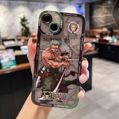 a person holding up a cell phone case with an image of the character street fighter