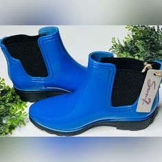 Get Ready To Walk In The Rain With These Stylish Blue Rubber Rain Booties From Seven7. Made For Women With A Us Shoe Size Of 6, These Ankle Boots Have An Almond Toe Shape And A Pull-On Closure Style. The Low 1-1.9 Inch Heel And Flat Heel Style Will Keep You Comfortable While The Waterproof And Water-Resistant Features Will Keep Your Feet Dry In Any Season. These Booties Are Perfect For Rain And Puddles And Are Made With Quality Rubber Material. The Outsole Is Also Made Of Rubber And The Lining I Casual Blue Slip-on Boots, Blue Synthetic Boots With Round Toe, Casual Blue Rain Boots With Round Toe, Blue Casual Slip-on Boots, Blue Casual Closed Toe Boots, Short Black Rain Boots, Walk In The Rain, Red Rain Boots, Pink Rain Boots