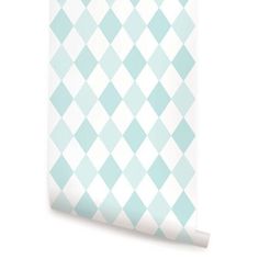 a blue and white wallpaper with checkered pattern on the bottom half of it