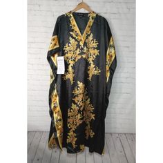 Ashro Black & Gold Floral Design Long Caftan Dress One Size Fits Most. Condition Is New #1521 Handling Time: We Have A 1 Day Handling Time & Ship Items Out Every Business. Day So Expect To Get Your Item Very Fast!! Packaging: We Package Every Item With Care To Ensure Safe Delivery. If There Is Any Issues, Please Contact Us. Buy With Confidence, Check Out Our Feedback! New Items Added Daily. Traditional Black V-neck Abaya, Black Printed V-neck Kaftan, Elegant Black Free Size Dress, Black Long Free Size Dress, Black Printed One Size Dress, Spring Black Maxi-length Kimono, Black Maxi Length Kimono For Spring, Black Printed Maxi Dress Free Size, Traditional Black Kaftan For Vacation