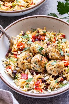 two bowls filled with pasta and meatballs