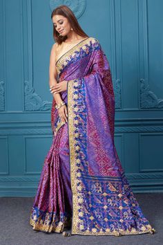 Look royal at weddings and festive occasions in this alluring purple embroidered Patola silk saree, It comes with a matching blouse piece. Disclaimer: The shown stitched blouse on the model is for display purpose only. The saree comes with a matching blouse piece and finished with fall and piko. Purple Katan Silk Pre-draped Saree With Zari Work, Purple Dola Silk Pre-draped Saree, Purple Paithani Silk Pre-draped Saree For Wedding, Purple Katan Silk Pre-draped Saree With Cutdana, Traditional Purple Paithani Silk Pre-draped Saree, Traditional Purple Pre-draped Saree, Purple Pre-draped Saree With Traditional Pallu, Bollywood Style Purple Art Silk Pre-draped Saree, Festive Purple Embroidered Pre-draped Saree