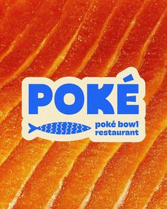 an orange fish sticker on the side of a piece of food that says poke poke bowl restaurant