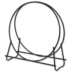 a black metal stand with two circular sections on each side and one round section in the middle