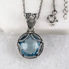 Handmade Sterling Silver Filigree Pendant Necklace with Genuine Swiss Blue Topaz Gemstone and Silver Chain Matching earrings and ring are available https://www.etsy.com/listing/1137162683/natural-swiss-blue-topaz-earrings?ref=listings_manager_grid https://www.etsy.com/listing/1123195364/natural-swiss-blue-topaz-silver-ring-925?ref=listings_manager_grid Material: 925 Solid Sterling Silver Genuine Natural Swiss Blue Topaz Gemstone Dimension: 12 mm, Round, Faceted Pendant Length: 1.10 inches Width: Topaz Birthstone Jewelry With Round Stone, Elegant Topaz Jewelry As A Gift, Elegant Topaz Jewelry For Gift, Blue Topaz Necklaces With Diamond Accents For Gift, Blue Topaz Necklace With Diamond Accents For Gift, Blue Topaz Necklace With Diamond Accents, Elegant Silver Topaz Jewelry, Formal Round Topaz Stone Jewelry, Topaz Necklace With Diamond Accents As Gift