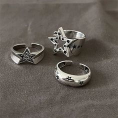 Delight in the star-shaped design of our Y2K Adjustable Rings! Crafted with Cubic Zirconia and Zinc alloy, these rings will have you looking stellar. DETAILSPattern Type: StarMaterial: Cubic ZirconiaMetals Type: Zinc alloy Egirl Jewelry, Rings Y2k, Ring Y2k, Lover Fashion, Pentagram Design, Hollow Ring, Trendy Rings, Edgy Jewelry, Tension Setting