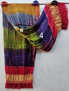 FREE Petticoat with every Saree and Legging with every Dupatta Order Pure Modal Silk Dupattas, With Tissue Pallu, Organic Multi Colors, Banjara Style, Natural Dyed, Dupatta for Women Shipping through DHL, FedEx, UPS, Indian Speed post, USPS Measurements: Length: 100 Inch Width: 44 Inch Fabric : Modal Silk with Tissue Pallu Feel: Soft Color: 100% Organic/Vegetable NOTE: As it is purely handmade, design may slightly vary while deliver.  FEATURES  - Handcrafted - Hand block - Hand printed - Handmad Luxury Multicolor Batik Print Dupatta, Luxury Multicolor Silk Thread Dupatta, Luxury Multicolor Silk Dupatta, Luxury Multicolor Dupatta With Weaving Work, Luxury Multicolor Unstitched Dupatta, Cheap Dupatta With Pallu For Puja, Traditional Festival Dupatta At Affordable Price, Luxury Multicolor Dupatta With Woven Motifs, Luxury Multicolor Dupatta For Rituals