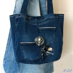 a denim bag with a flower on it