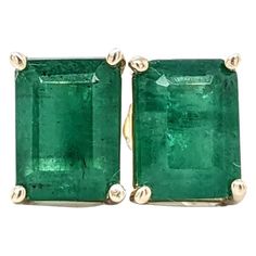 These beautiful stud earrings feature a pair of 3.2 carat weight Zambian Emerald gemstones set in solid 14K gold. These Zambian Emerald earrings make a lovely May birthstone gift for your loved ones! Specifications Item Type: Earring Center Stone: Emerald Treatment: Oiled Weight: 2/3.2 cttw Head size: 8x6mm Shape: Emerald cut Hardness: 7.5-8 Country of Origin: Zambia Metal: 14k/1.29g SKU: EME8X6/1271 Emerald Studs, Victorian Style Rings, Beautiful Stud Earrings, Emerald Earrings Studs, Jewelry Safe, Solitaire Studs, Zambian Emerald, May Birthstone, Birthstone Gifts