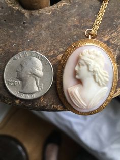 "Antique 10K Gold Victorian Pink Angel Skin Coral 3D Cameo Engraved Necklace 18\" Offered here is an antique 10k gold Victorian oval pink angel skin coral 3D cameo filigree necklace measuring; 18\" long. The engraved work & setting are just breath taking! The cameo measure 1.5\" high x 1 1/8\" wide. This piece is stamped 10K. Necklace closes securely with a jump ring. The chain is gold filled. Marked 1/20 12K. In nice, sturdy, excellent condition showing few signs of wear. Weighs; 3.6dwt or Pink Heirloom Jewelry Collectible, Elegant Pink Jewelry With Engraving, Elegant Engraved Pink Jewelry, Elegant Pink Engraved Necklace, Elegant Pink Engraved Jewelry, Antique Pink Jewelry For Gift, Pink Engraved Pendant Jewelry, Engraved Pink Pendant Jewelry, Pink Engraved Round Necklace