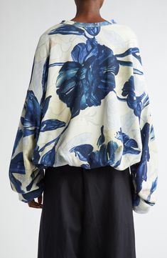 Voluminous gathered sleeves and dropped shoulders accentuate the slouchy, oversized fit of a cotton-fleece sweatshirt patterned in a layered floral print. 21" length (size Small) Crewneck Dropped shoulders Lined 100% cotton Dry clean or machine wash, dry flat Made in Turkey Designer Clothing Fleece Sweatshirt Pattern, Gathered Sleeves, Sweatshirts Pattern, Blue Fits, Fabric Gift Bags, Fleece Sweatshirt, Dries Van Noten, Fabric Gifts, Free Fabric