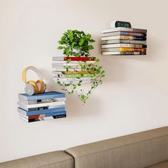 two books are stacked on top of each other in the shape of a planter