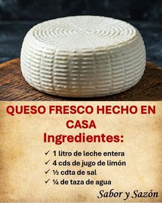 a piece of cheese sitting on top of a wooden table next to a sign that says queso fresco hecho en casa ingredientes