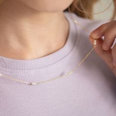 Looking for a classic and timeless gift that your little girl will be able to wear for years to come? This beautiful freshwater cultured pearl necklace is such a sweet detail to celebrate your little girls milestone. An elegant 14k yellow gold necklace that features small 3mm freshwater cultured pearls beautifully patterned to create a dainty piece for your little girl. Measuring 16" long with a 1" extension, this adorable necklace can easily fit your little girl on her special day and grow with her as years go by. Gift box is included with purchase. Age Group: Classic Gift for Little Girls, Preteens & Teens; Safe for Sensitive Skin Material: 14k Yellow Gold Pearl Size: 3mm; Freshwater Cultured Pearl Metal Stamp:14k Gift Box Included Kids Pearl Necklace Children, Preteen Necklace, Elegant Hypoallergenic Birthstone Necklace For Anniversary, Teen Necklaces, 14k Yellow Gold Necklace, Yellow Gold Necklace, Cultured Pearl Necklace, Kids Necklace, 14k Gold Necklace