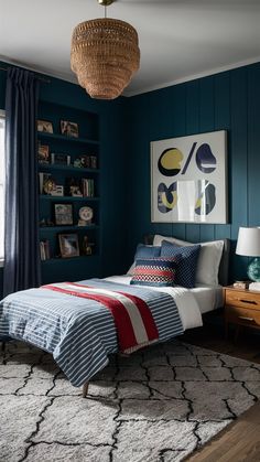 a bedroom with blue walls and white bedding