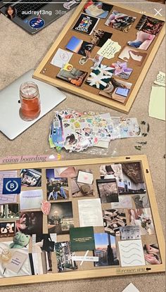 there are many pictures on the table and one has a pin board with magnets attached to it