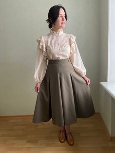 "Escada vintage Skirt . Classic  skirt.  Great vintage condition.  Brand: Escada. Made in W-Germany.  Material: light wool.  Size 42, I think will fit size L, maybe M. please see measurements (lying flat): waist-46cm/18,1\" Full length-80cm/31,5\" **Model is size S/M and 170 cm 66.8\" growth, bust 89cm/35.0\", hips 99cm/39.0.  Model is size M and 170 cm height, it's a little bit large on me.  **This item will come to you freshly laundered and ready to wear." Vintage Midi Skirt, Classic Skirts, Skirt Vintage, Vintage Skirt, Pleated Skirt, Ukraine, Midi Skirt, Full Length, Ready To Wear