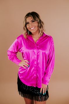 Get ready to shine in the Get to Glam Satin Rhinestone Top! A perfect concert-worthy top. This hot pink rhinestone button-up is perfect for a bachelorette girls' night out; embrace the vibrant energy with this satin rhinestone top! Rhinestone Pink Satin Top lightweight + breathable Neckline: Button up with a collar Fabric: 95% Cotton, 5% Spandex Imported Fit: Oversized breezy fit Model Specs: Emily is wearing a size small in the photo.How will this item fit you? Check out our MODEL SPECS (Typica Pink Satin Top, Rhinestone Top, Shania Twain, Vip Group, Everyday Chic, Vibrant Energy, Satin Top, Pink Rhinestones, Pink Satin