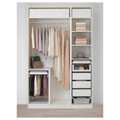 an open closet with clothes and other items