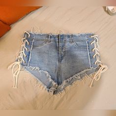 Forever 21 Lace Up Jean Shorts. Super Short. Size M But Can Be Adjusted To Bigger Size With Laces On The Sides. Bold Statement Piece. Stand Out At The Beach! Only Tried On But Never Worn Forever 21 Blue High-waisted Shorts, Forever 21 High Rise Bottoms For Summer, Forever 21 High-rise Summer Bottoms, High Rise Bottoms From Forever 21 For Summer, Forever 21 High Waist Bottoms For Vacation, Forever 21 Bottoms With Built-in Shorts For Summer, Forever 21 High Waist Vacation Bottoms, Forever 21 High-waist Bottoms For Vacation, High Waist Bottoms By Forever 21 For Beach