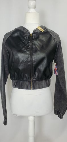 Womens Cropped Jacket Medium Black Faux Leather and Denim Zip Long Sleeve NEW 1171-A Raglan baseball bomber style with front faux leather perforated panels gives an edge! Cinched waist and sleeves. Nice layering jacket (or could wear on its own!) alternative. Material is 77% cotton, 21% polyester and 2% spandex for a touch of give. Please see "condition description" and "item specifics" for added detail.  Measurements (item is flat laid when measured and unstretched):  Please see photos: edge to edge shoulder, edge to edge armpit and length from mid edge shoulder to bottom hem   Thank you for stopping and please contact me with ANY questions. Have a fantastically cute day!   Notes:   See photos for sizing chart when available.  When clothing item displayed on Darla the dress form US measur Vintage Cropped Leather Jacket, Edgy Cropped Biker Jacket With Zipper, Cropped Leather Biker Jacket With Zipper, Fitted Cropped Leather Outerwear, 80s Cropped Leather Jacket, Womens Cropped Jacket, Layering Jacket, Light Coat, Leather Denim