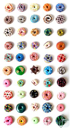 a bunch of donuts that are sitting on a table with the words donuts and do