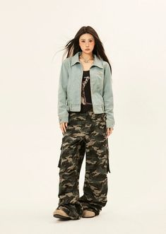 Embrace the essence of street style with our Camouflage Cargo Trousers, featuring bold double side belt straps for a blend of function and flair. Crafted from a soft yet durable blend of 95% cotton and 5% polyester fiber, these pants are tailored to thrive in your everyday wardrobe rotation. The classic camouflage pattern exudes a retro vibe, while multiple pockets and the loose fit cut ensure they are as practical as they are fashionable. Pair these trousers with a tucked-in basic tee and chunk Combat Style Cargo Pants For Streetwear In Fall, Spring Combat Cargo Pants For Streetwear, Spring Military Cargo Pants For Streetwear, Spring Military Style Cargo Pants For Streetwear, Spring Camouflage Pants For Streetwear, Trendy Camouflage Cargo Pants For Streetwear, Camouflage Green, Green Fits, Dynamic Design