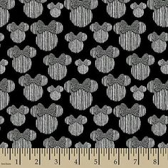 a black and white mickey mouse print fabric