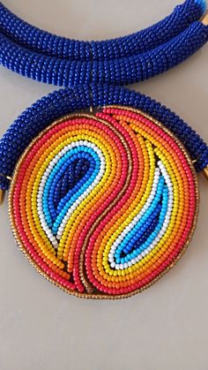 African Necklace, African Jewelry, African Beaded Necklace, Zulu Beaded Necklace, Dark Blue Necklace, Pendant Necklace, Gift For Her This stunning pendant necklace is superbly crafted which makes you stands out in any occasion. Main Color - Dark Blue or Royal Blue. Different colors of your choice can be available. Wholesale available at a fair price. For any query please send me a convo or an e-mail. Happy Shopping Handmade Blue Beaded Necklaces With Oval Beads, Unique Blue Beaded Necklaces, Unique Blue Beaded Chain Necklace, Handmade Blue Beaded Necklace With Oval Beads, Unique Blue Beaded Necklace, Blue Oval Bead Necklaces, Blue Oval Beaded Chain Necklaces, Blue Beaded Chain Necklace With Oval Beads, Blue Beaded Oval Necklaces